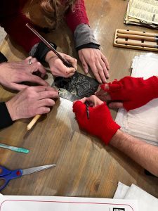 Cloudia and her assistants showing us the process